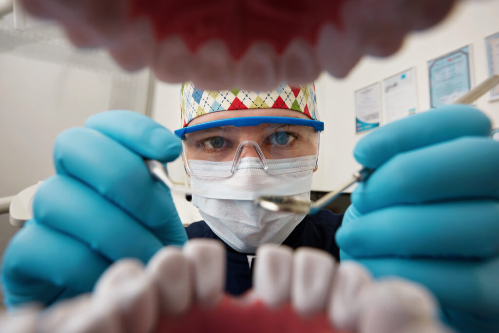 Dentist placing dental crown at Island Park Dental Ottawa