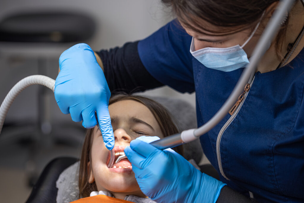 Dentist performing emergency root canal in Ottawa
